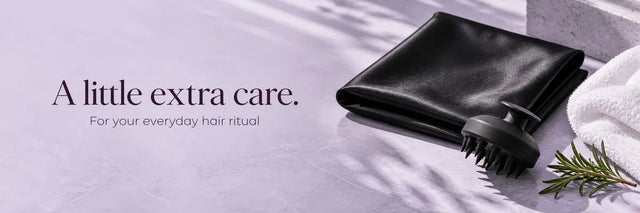 A little extra care. For your everyday hair ritual — black satin and scalp brush with a white towel.
