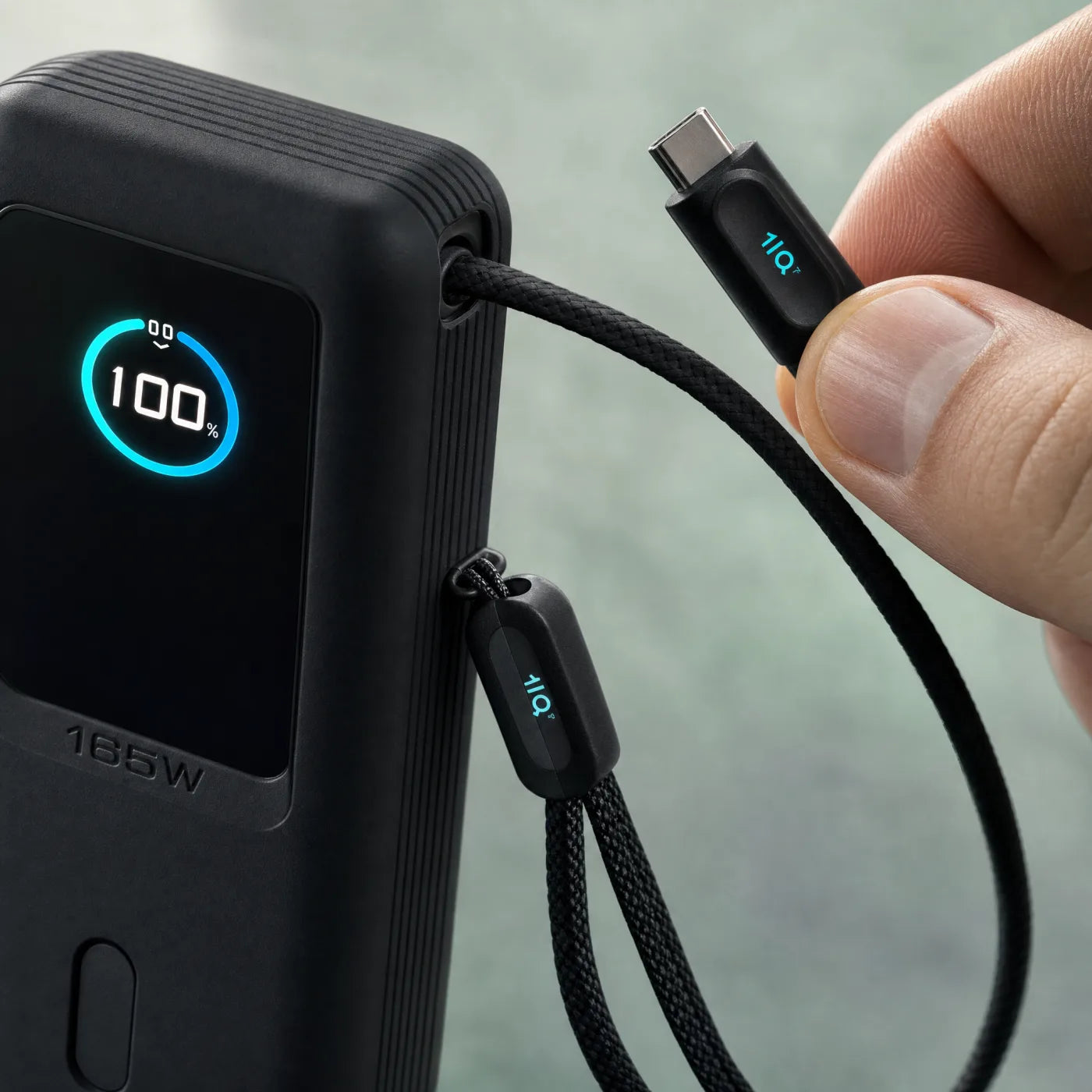 Pulling the retractable USB-C cable out of the LT04